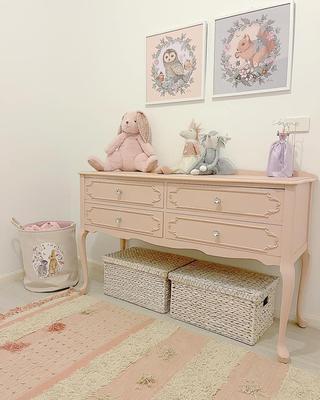 Paint the dresser to match the theme